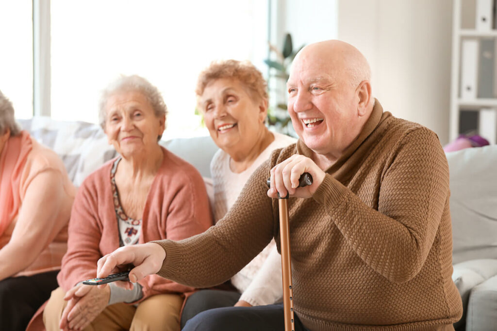 SoCo Village | Group watching TV