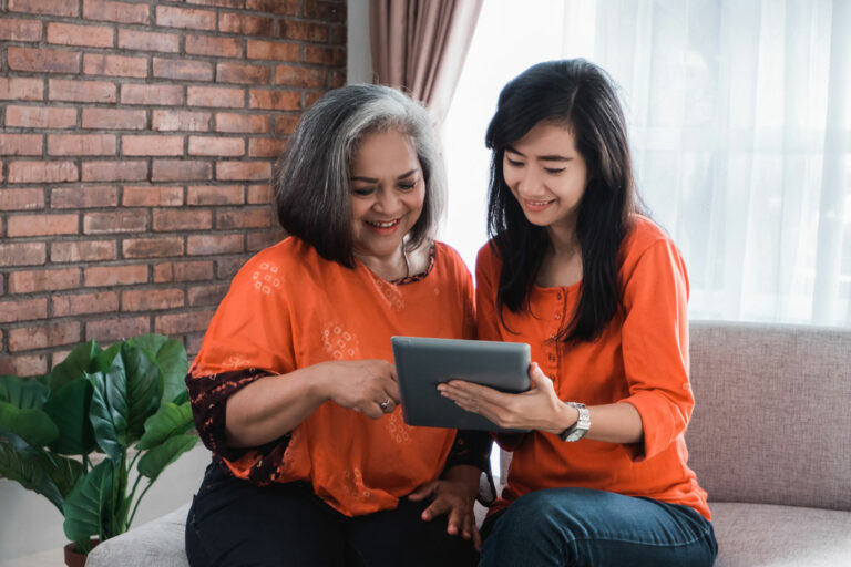 SoCo Village | Senior women and her daughter using a tablet