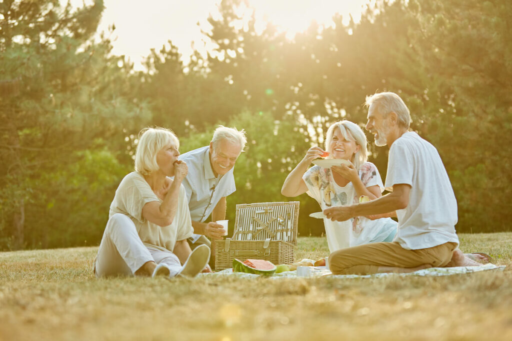 SoCo Village | Happy seniors having a picnic