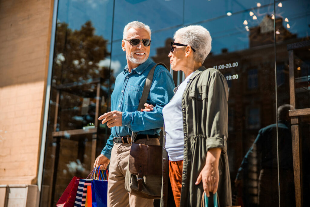 SoCo Village | Senior couple walking arm and arm