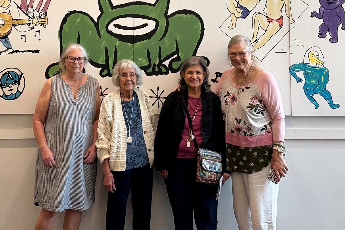 Soco Village | Senior friends at an art exhibit